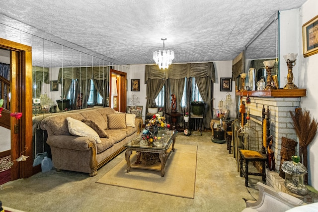 living room with a chandelier, a brick fireplace, light carpet, and a textured ceiling