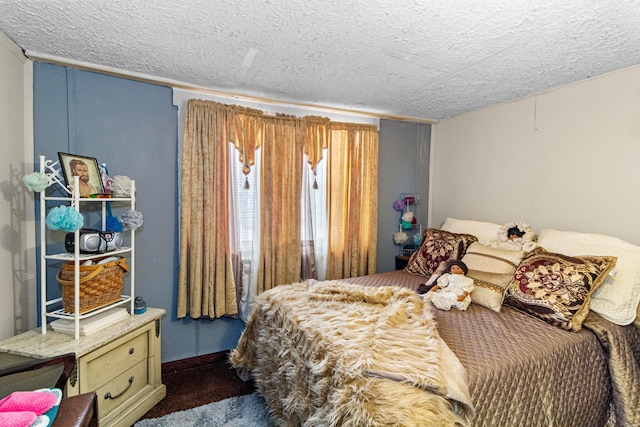 bedroom with a textured ceiling