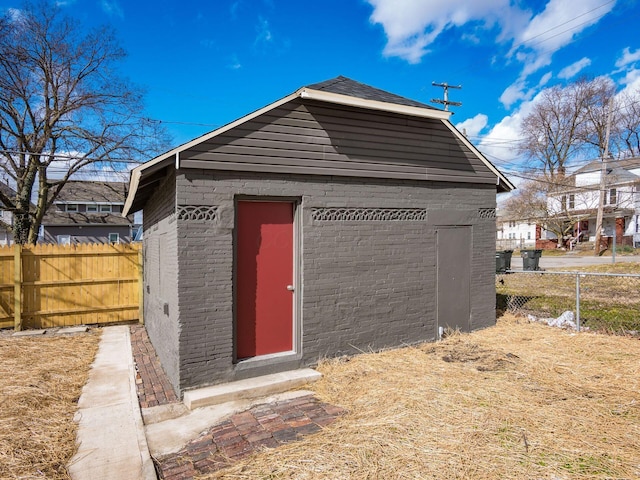 view of outdoor structure with an outdoor structure and fence