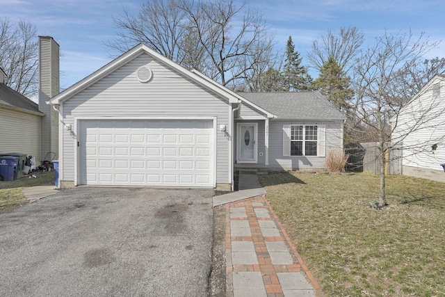 ranch-style house with aphalt driveway, an attached garage, and a front lawn