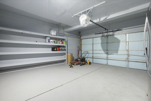 garage featuring freestanding refrigerator