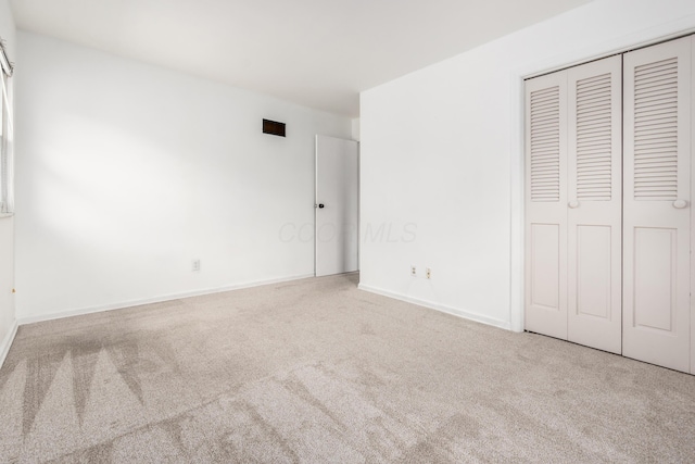 2715 Kenview Rd S, Columbus, OH 43209 - unfurnished bedroom with carpet floors, a closet, and baseboards