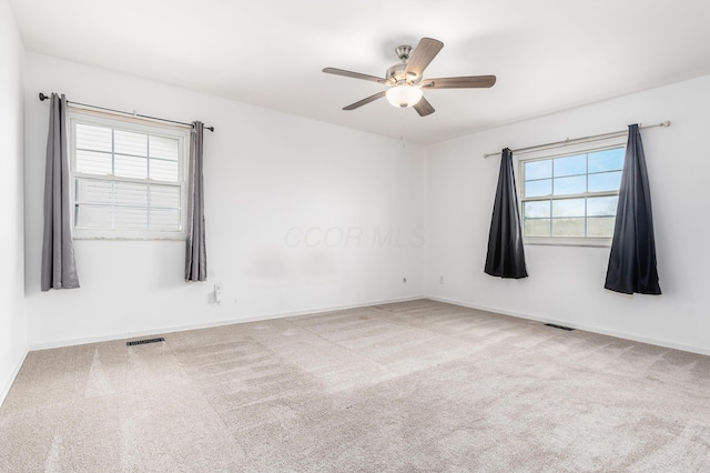 2715 Kenview Rd S, Columbus, OH 43209 - carpeted empty room with visible vents, baseboards, and ceiling fan