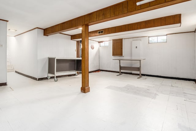 2715 Kenview Rd S, Columbus, OH 43209 - below grade area with baseboards, tile patterned floors, wood walls, and visible vents