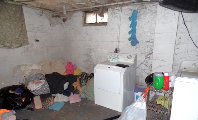 laundry room featuring washer and dryer and laundry area