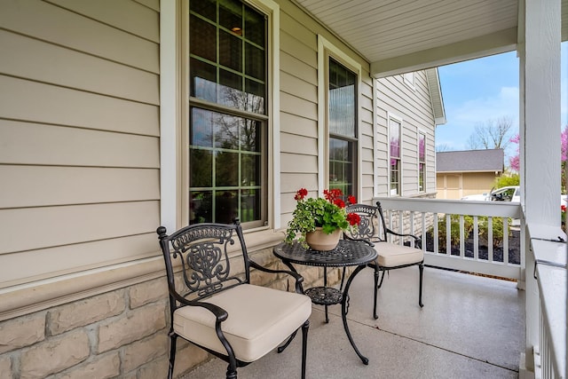 balcony featuring a porch