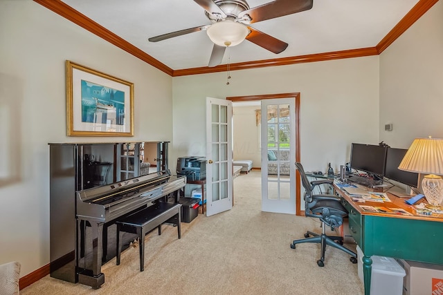 carpeted office space with a ceiling fan, baseboards, ornamental molding, and french doors
