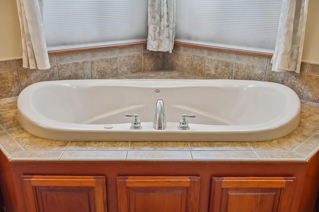 bathroom featuring a jetted tub