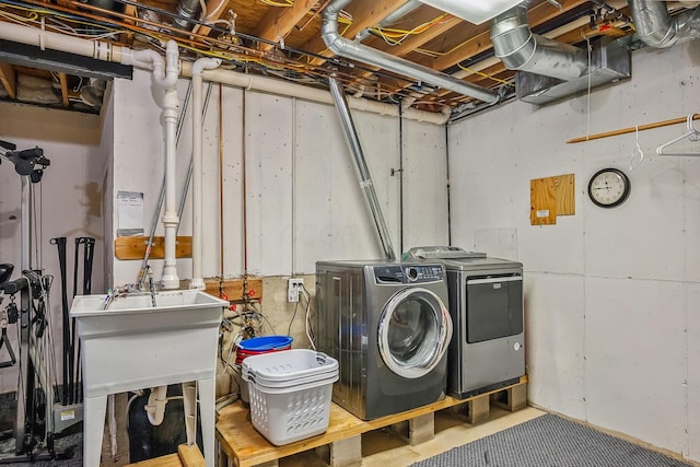 washroom featuring independent washer and dryer and laundry area