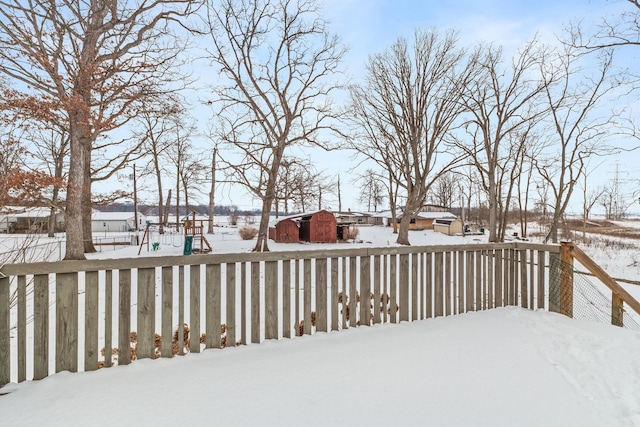 view of snow covered deck