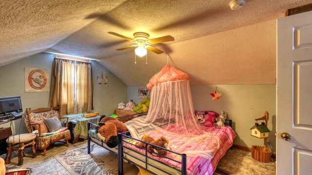 1295 Maple Brook Rd, New Concord, OH 43762 - bedroom with baseboards, ceiling fan, a textured ceiling, and lofted ceiling