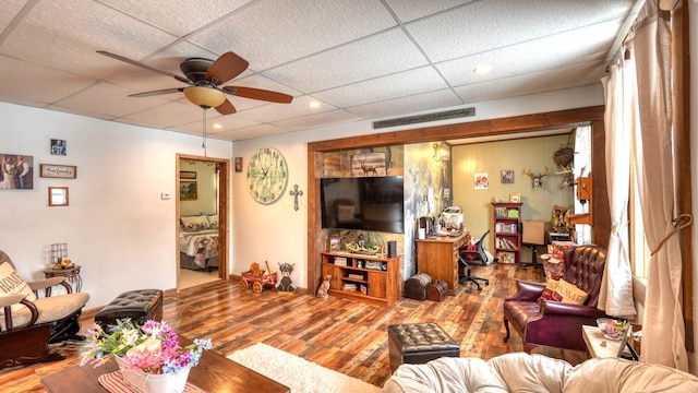 1295 Maple Brook Rd, New Concord, OH 43762 - living room with wood finished floors, a ceiling fan, visible vents, and a paneled ceiling