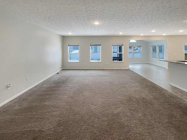 1128 Legacy Ln, Pataskala, OH 43062 - spare room with recessed lighting, a textured ceiling, and carpet floors