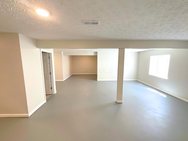 1128 Legacy Ln, Pataskala, OH 43062 - basement with a textured ceiling and recessed lighting