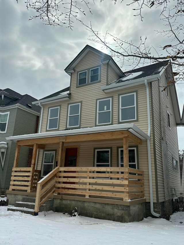 view of front of home featuring covered porch