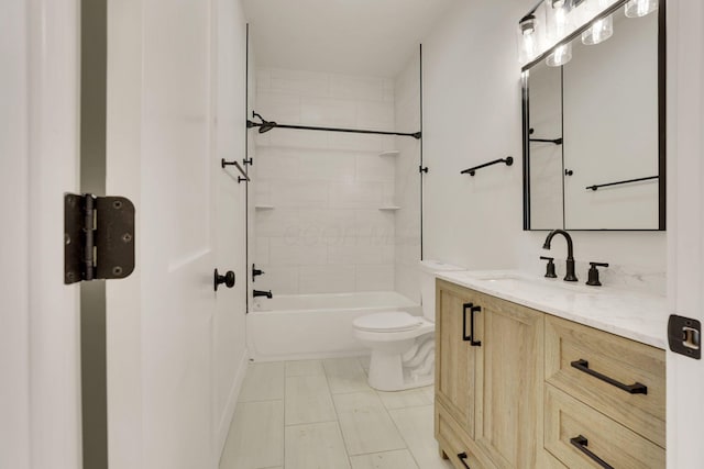 bathroom featuring toilet, bathing tub / shower combination, and vanity