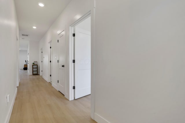 344 Buckingham St, Newark, OH 43055 - hall featuring light wood finished floors, baseboards, and recessed lighting