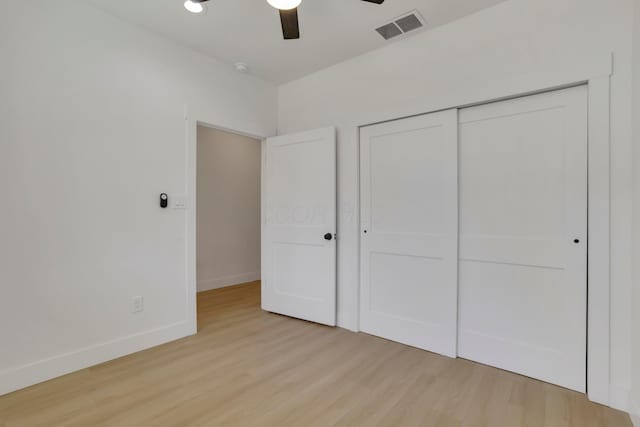344 Buckingham St, Newark, OH 43055 - unfurnished bedroom featuring wood finished floors, baseboards, a closet, and ceiling fan