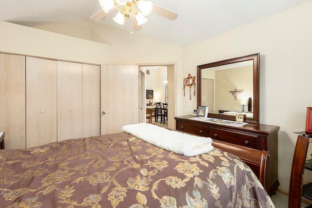 bedroom with a ceiling fan, a closet, and vaulted ceiling