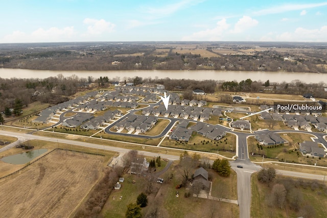 bird's eye view featuring a residential view and a water view