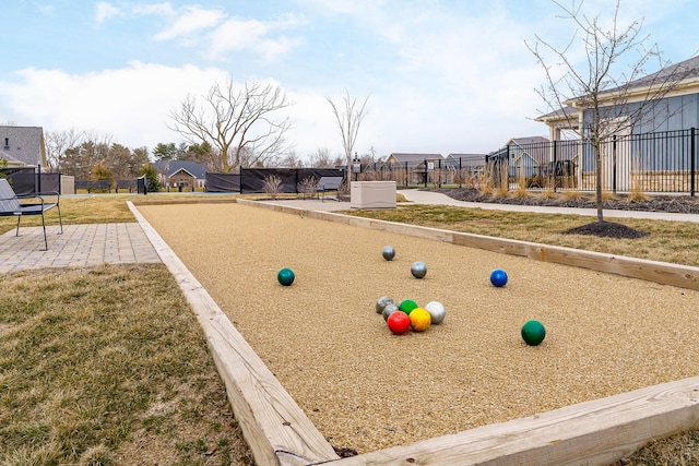 surrounding community featuring a patio area, a residential view, and fence