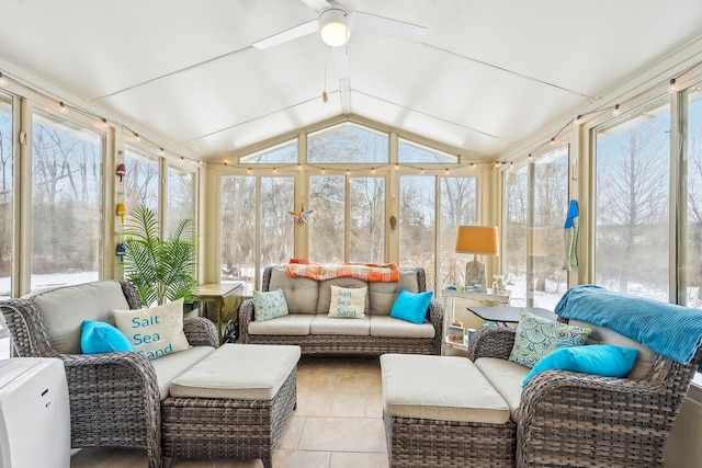 sunroom featuring vaulted ceiling and a ceiling fan