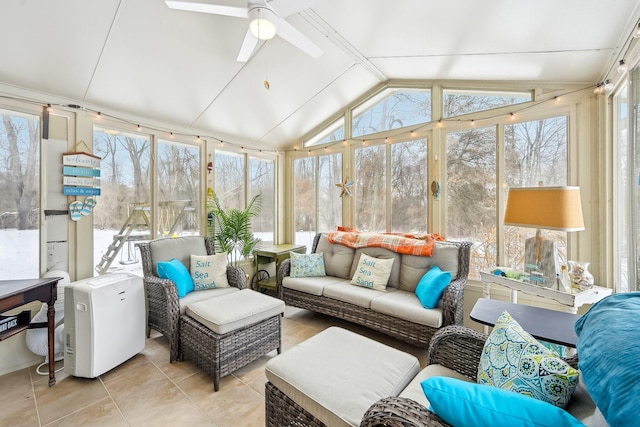 sunroom with vaulted ceiling and ceiling fan