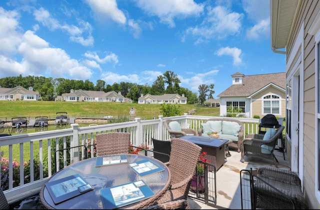 614 Newport Ln, Hebron, OH 43025 - view of patio / terrace with an outdoor living space with a fire pit, outdoor dining area, a residential view, and a wooden deck
