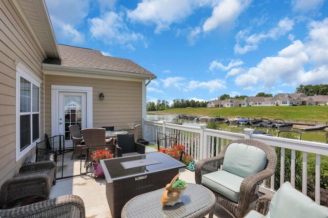 614 Newport Ln, Hebron, OH 43025 - deck with a water view, outdoor dining area, and outdoor lounge area