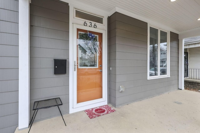 doorway to property featuring a porch