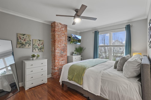 bedroom with ornamental molding, dark wood-style flooring, a ceiling fan, and baseboards