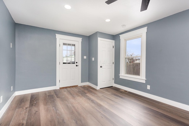 entryway featuring visible vents, baseboards, a ceiling fan, wood finished floors, and recessed lighting