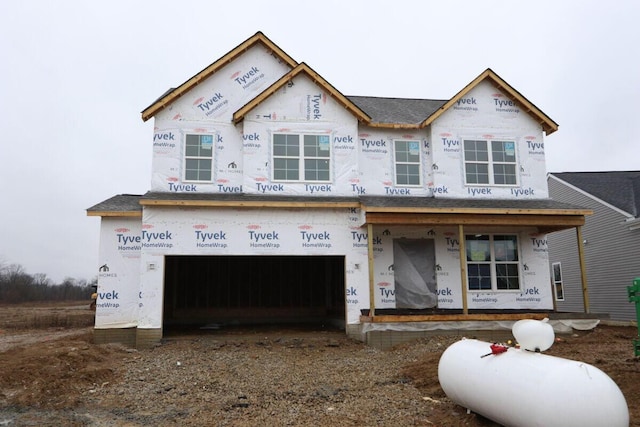 property under construction with an attached garage