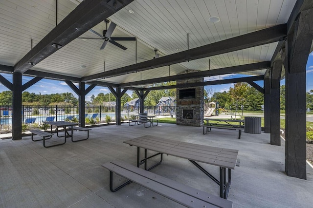 view of community with a patio area and fence