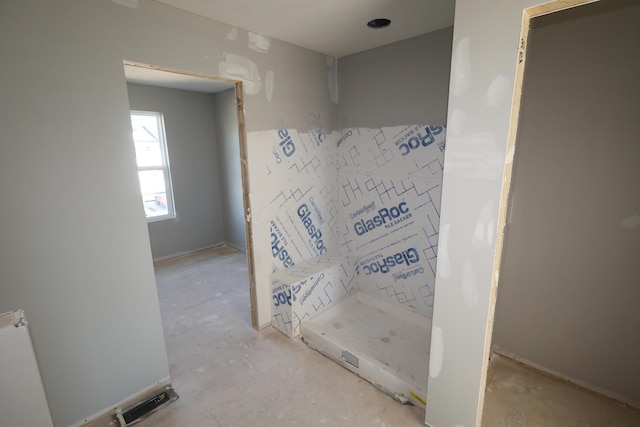 full bathroom with a shower stall