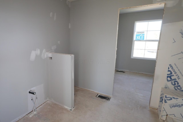 clothes washing area featuring visible vents