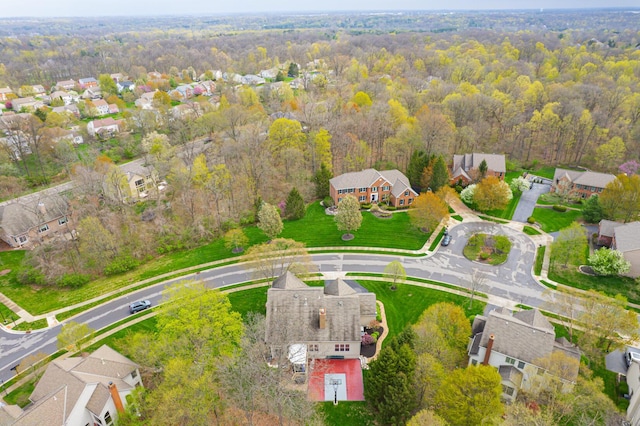 413 Ashmoore Cir E, Powell, OH 43065 - aerial view with a wooded view and a residential view
