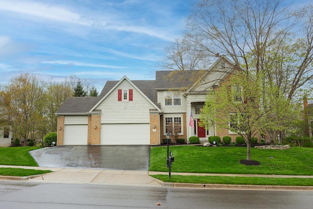 413 Ashmoore Cir E, Powell, OH 43065 - traditional-style home featuring concrete driveway, a front lawn, a garage, and brick siding