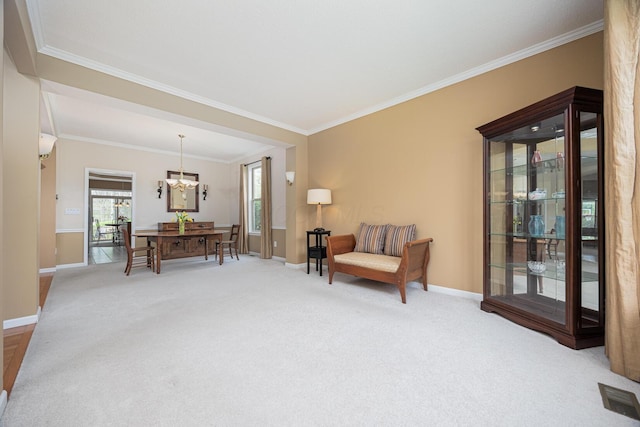 413 Ashmoore Cir E, Powell, OH 43065 - living area with crown molding, an inviting chandelier, visible vents, and baseboards