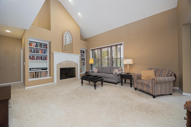 413 Ashmoore Cir E, Powell, OH 43065 - living area with high vaulted ceiling, carpet flooring, built in features, and baseboards