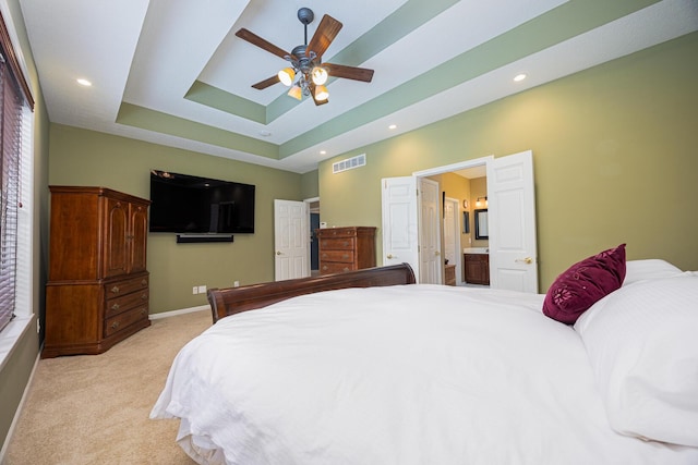 413 Ashmoore Cir E, Powell, OH 43065 - bedroom featuring recessed lighting, a raised ceiling, visible vents, baseboards, and light colored carpet