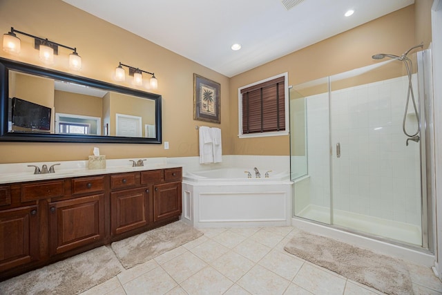 413 Ashmoore Cir E, Powell, OH 43065 - bathroom featuring tile patterned flooring, double vanity, a bath, a sink, and a stall shower