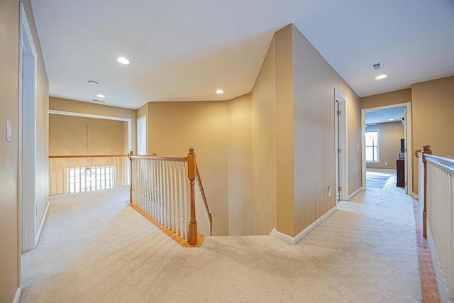 413 Ashmoore Cir E, Powell, OH 43065 - corridor featuring baseboards, recessed lighting, an upstairs landing, and carpet flooring