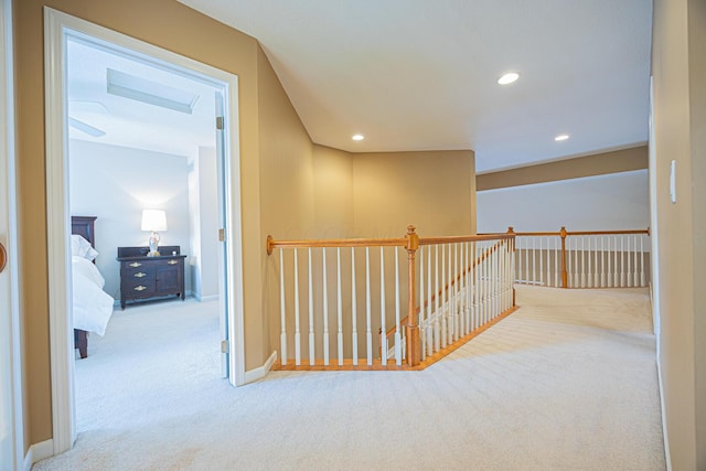 413 Ashmoore Cir E, Powell, OH 43065 - hallway featuring baseboards, recessed lighting, carpet floors, and an upstairs landing
