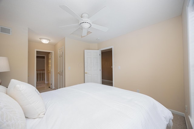 413 Ashmoore Cir E, Powell, OH 43065 - carpeted bedroom with baseboards, visible vents, and ceiling fan