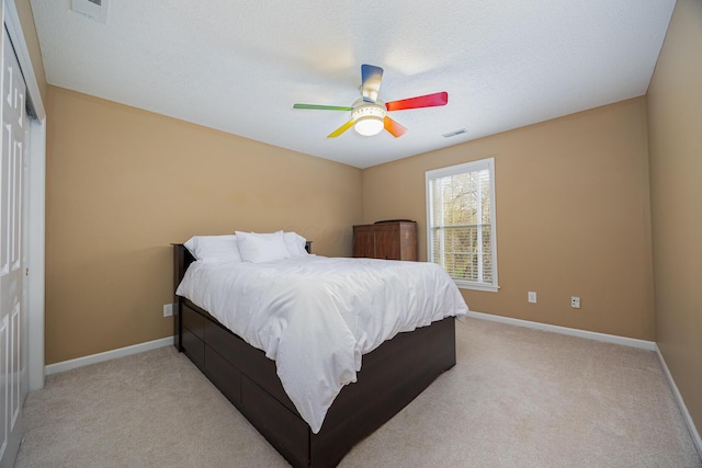 413 Ashmoore Cir E, Powell, OH 43065 - bedroom featuring baseboards, visible vents, and light carpet