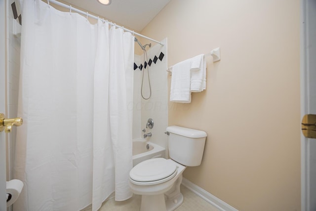 413 Ashmoore Cir E, Powell, OH 43065 - full bath featuring baseboards, shower / bath combo with shower curtain, tile patterned floors, and toilet