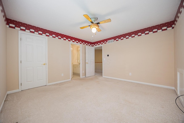 413 Ashmoore Cir E, Powell, OH 43065 - unfurnished bedroom featuring baseboards, visible vents, a ceiling fan, and carpet