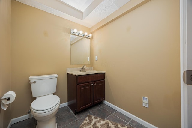 413 Ashmoore Cir E, Powell, OH 43065 - bathroom featuring tile patterned floors, baseboards, toilet, and vanity
