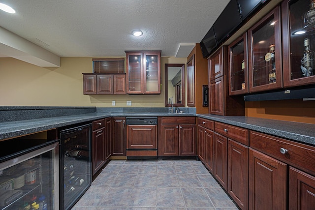 413 Ashmoore Cir E, Powell, OH 43065 - bar featuring beverage cooler, a sink, paneled dishwasher, and a textured ceiling
